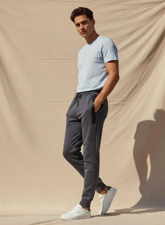Kappa  Kappa Men Drawstring Waist Joggers for Men | Best Price UAE